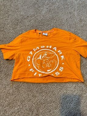 Gymshark Orange Cropped Tee with White Legacy Graphic